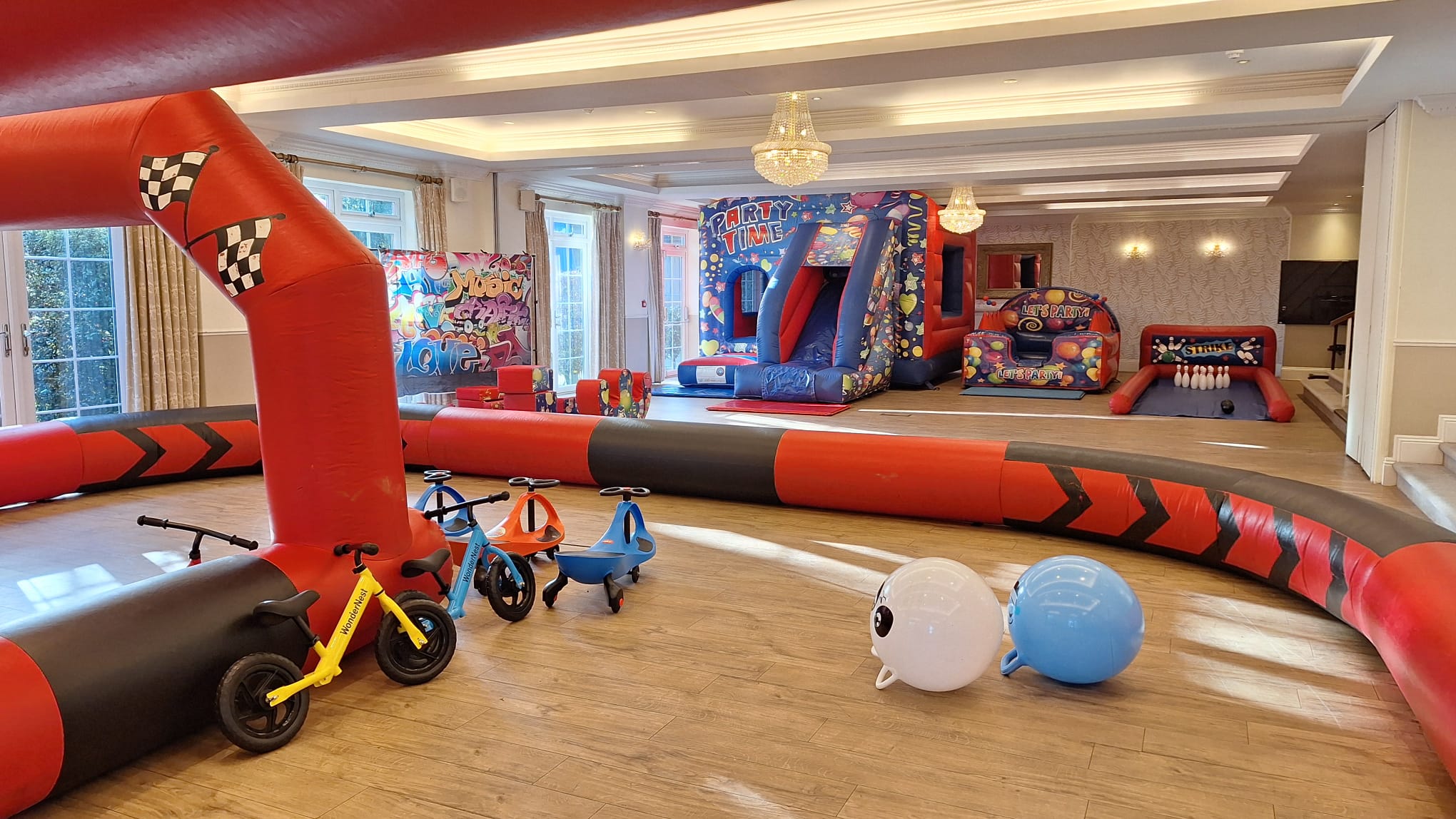 Indoor inflatables, games and ride-on toys available for corporate family fun days in Southampton